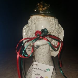 Hand painted porcelain angel by the artist Mary Belle Cordell